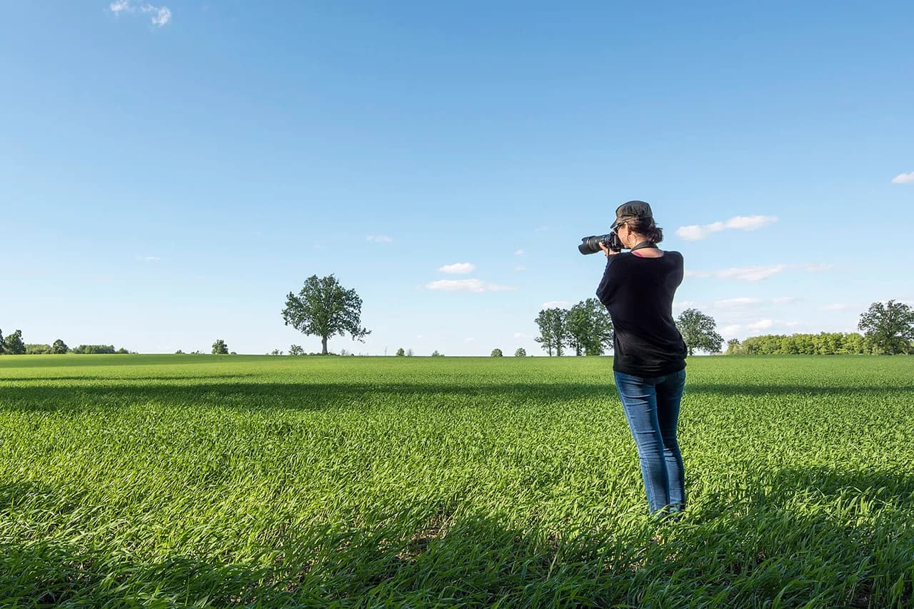Jody van der Kwaak photographing - photo by Greg Coman