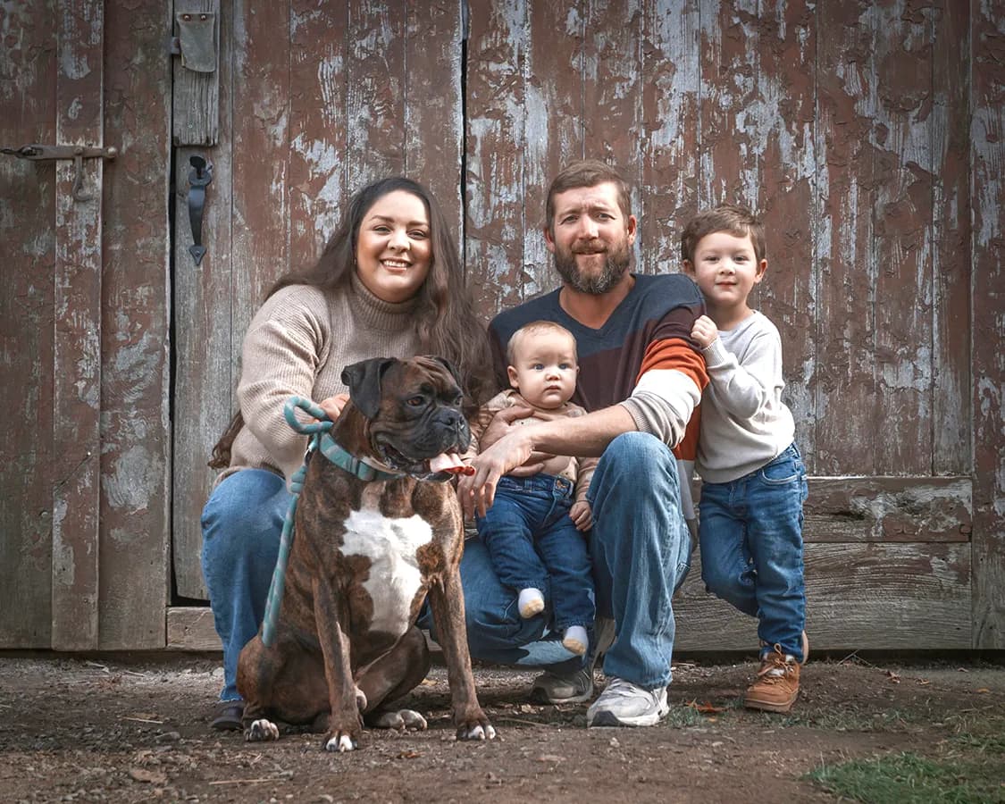 Authentic family portrait with genuine smiles